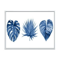 DesignArt 'Тропски лисја во класично сино' тропско врамено платно wallидно печатење